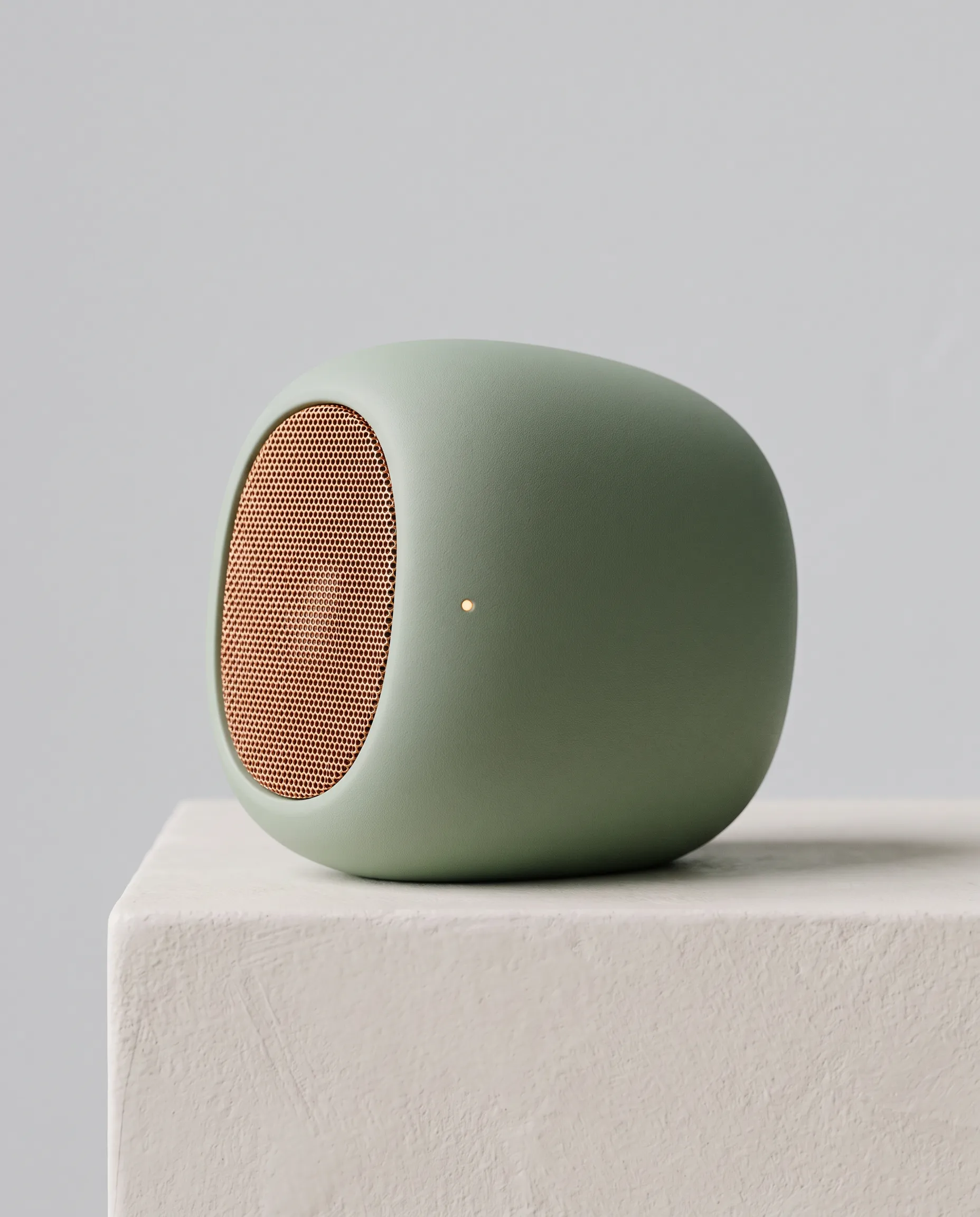 Sage speaker with a copper mesh grille on a plaster block